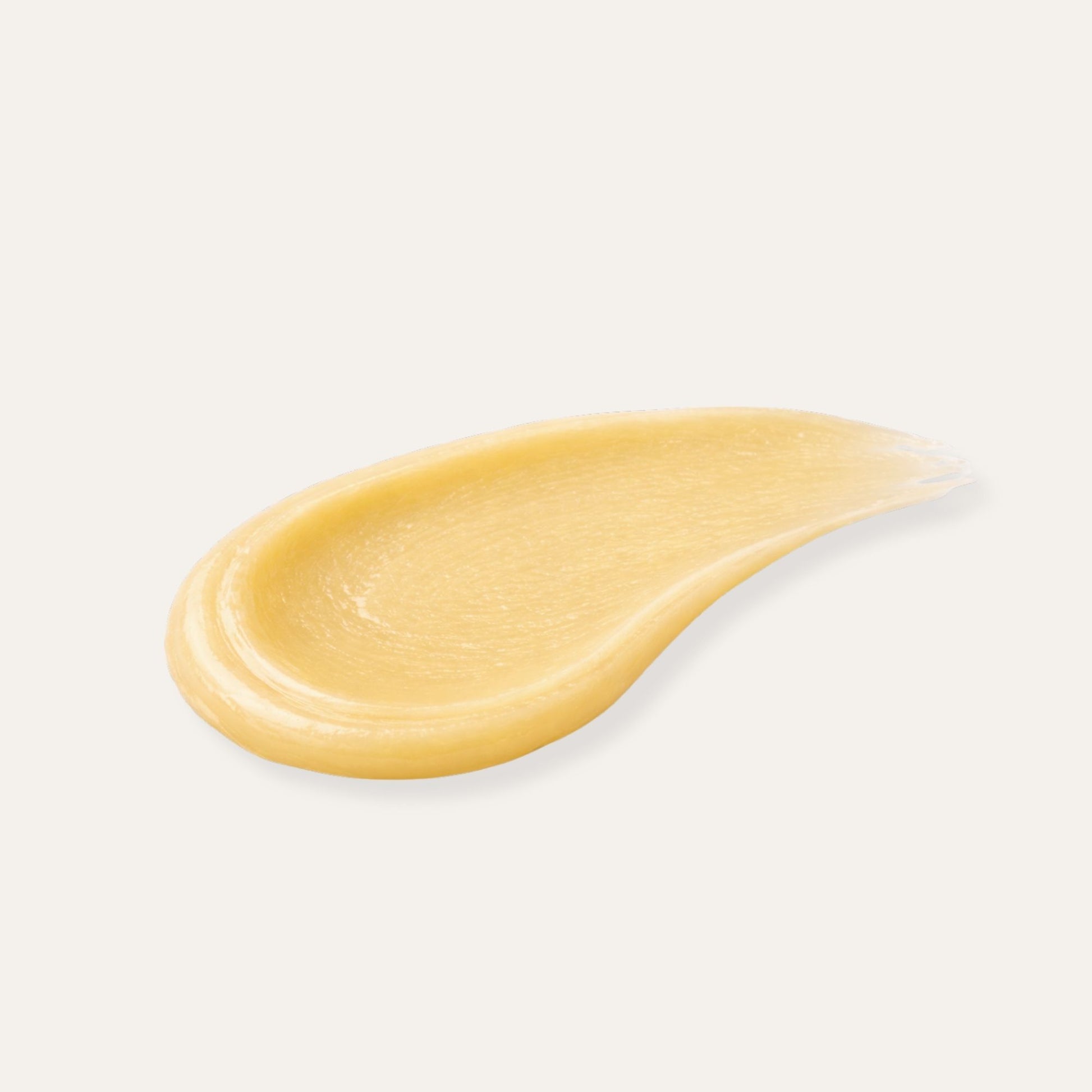 A Sample of Dry Hand Salve on a white ground to show its smooth texture. 