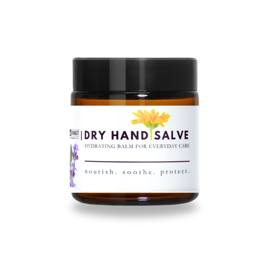 Jar of dry hand salve with a black lid on a white background